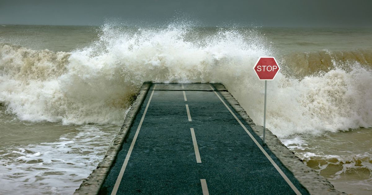 waves crashing on road